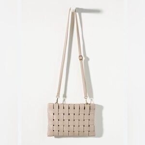 Anthropologie Lindy Adjustable crossbody & clutch bag in Tan vegan leather.